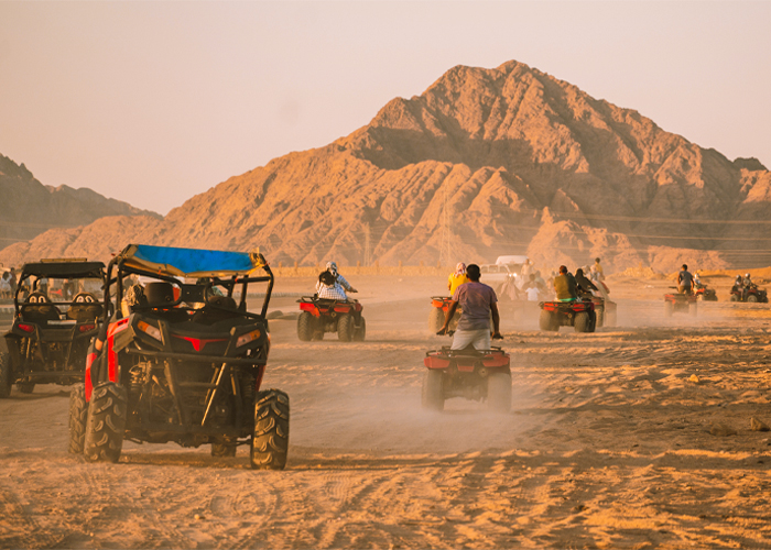 A wonderful view of tourists riding a desert bike in Egypt safari